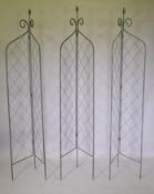 Three folding wrought iron garden trellises, 212cm high