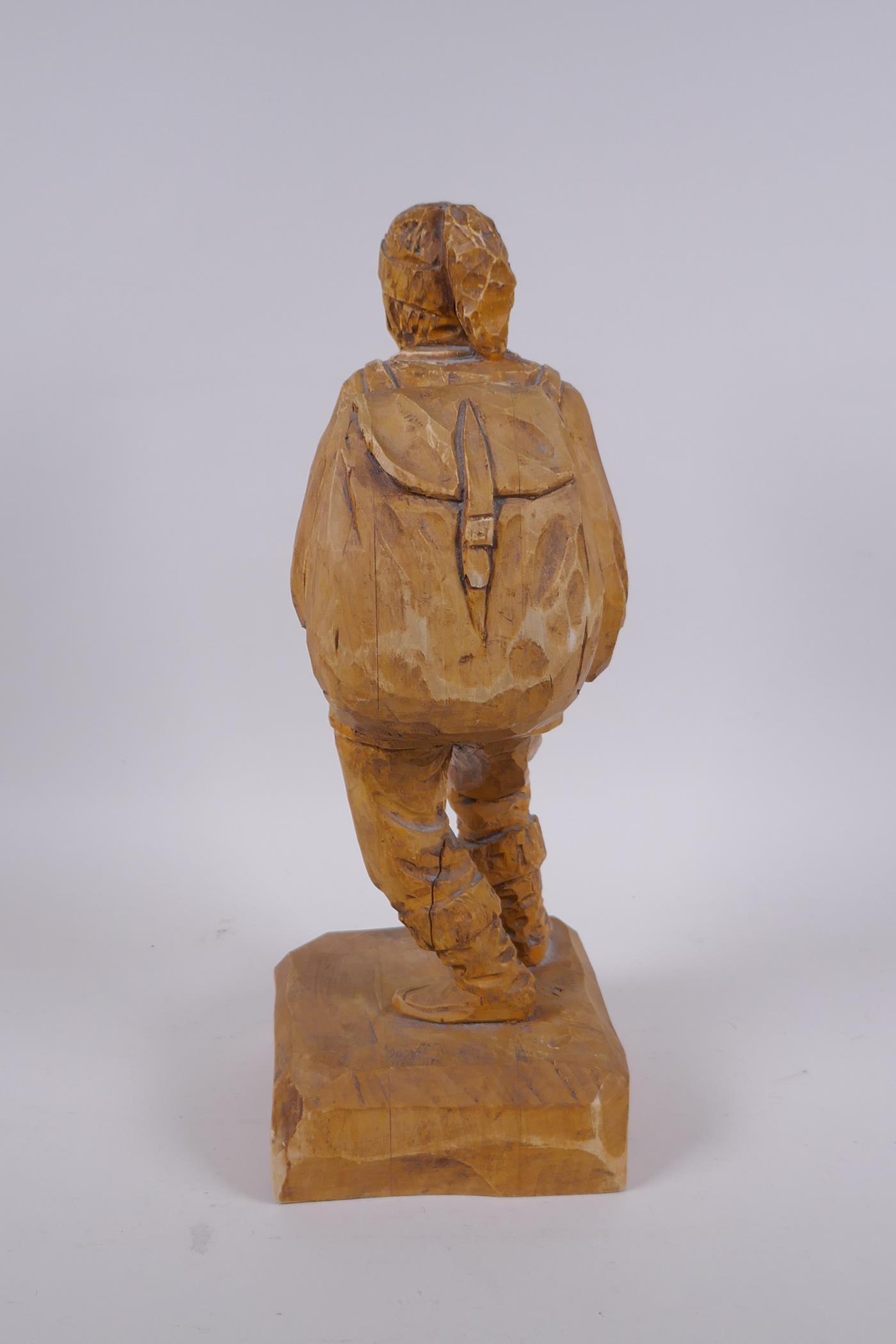 Adalbert Thibault, (Canadian), mid C20th wood carving of a hunter, 35cm high - Image 3 of 4