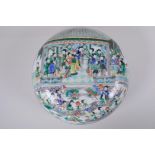 A late C19th/early C20th famille verte porcelain box and cover decorated with figures in a temple