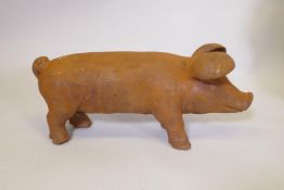 A cast iron piglet, 43cm long