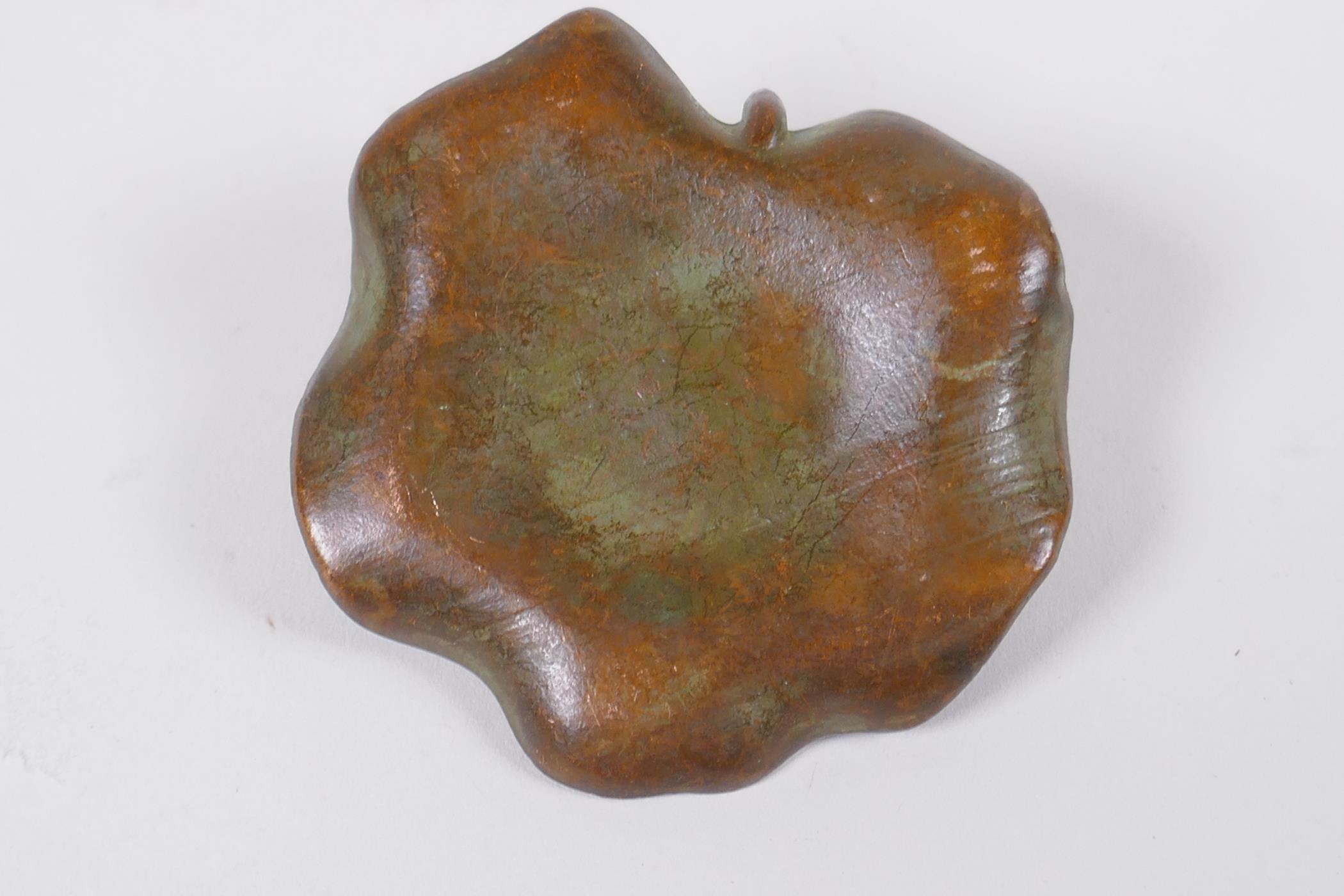 An oriental bronze incense stick holder in the form of a goldfish on a lily pad, 6cm diameter - Image 3 of 3