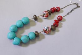 An oriental turquoise and enamelled bead necklace, 48cm long