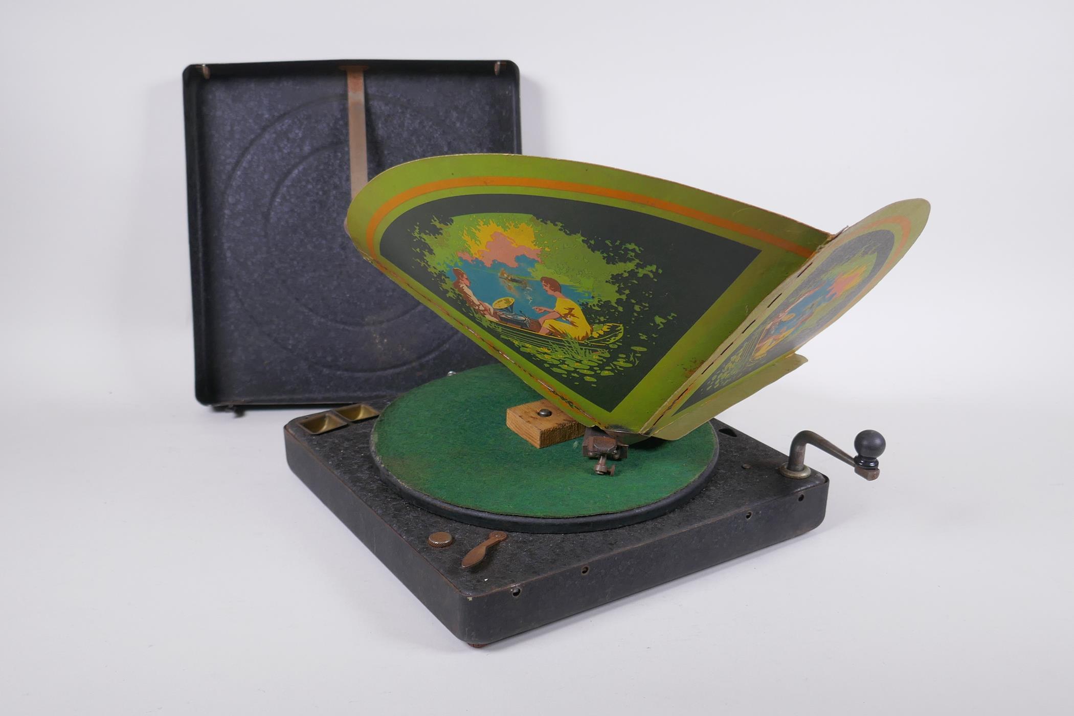 An early 1920s  Polly Portable type gramophone player with fold out loud speaker, 27 x 27 x 6cm
