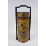 A Chinese gilt lacquered cylinder container with chased and painted dragon decoration, the cover