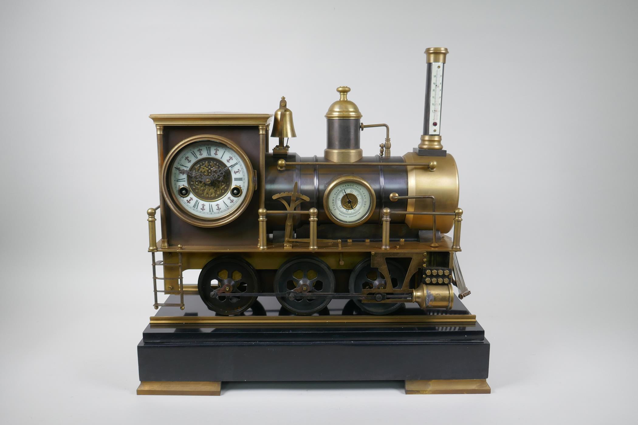 A French style bronze and brass automaton locomotive clock, 47cm long, 45cm high