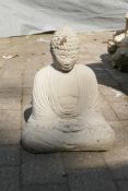 A reconstituted stone figure of Buddha, 42cm high