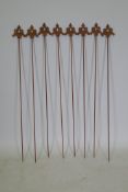 A set of eight cast iron gothic style plant stakes, 106cm long