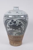 A Chinese blue and white porcelain Meiping vase decorated with carp in a lotus pond, character marks