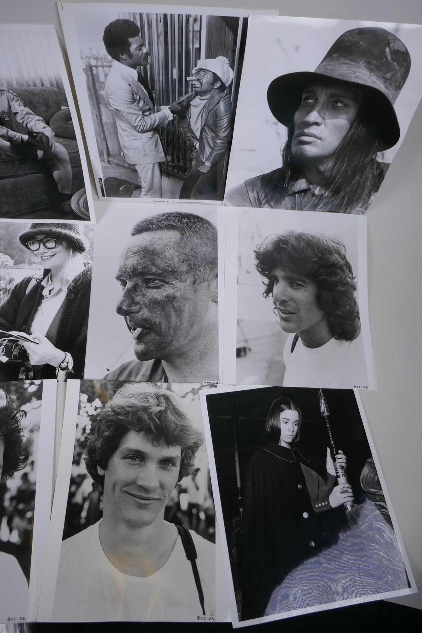 A quantity of black and white press and promotional photographs relating to films, including A - Image 4 of 6