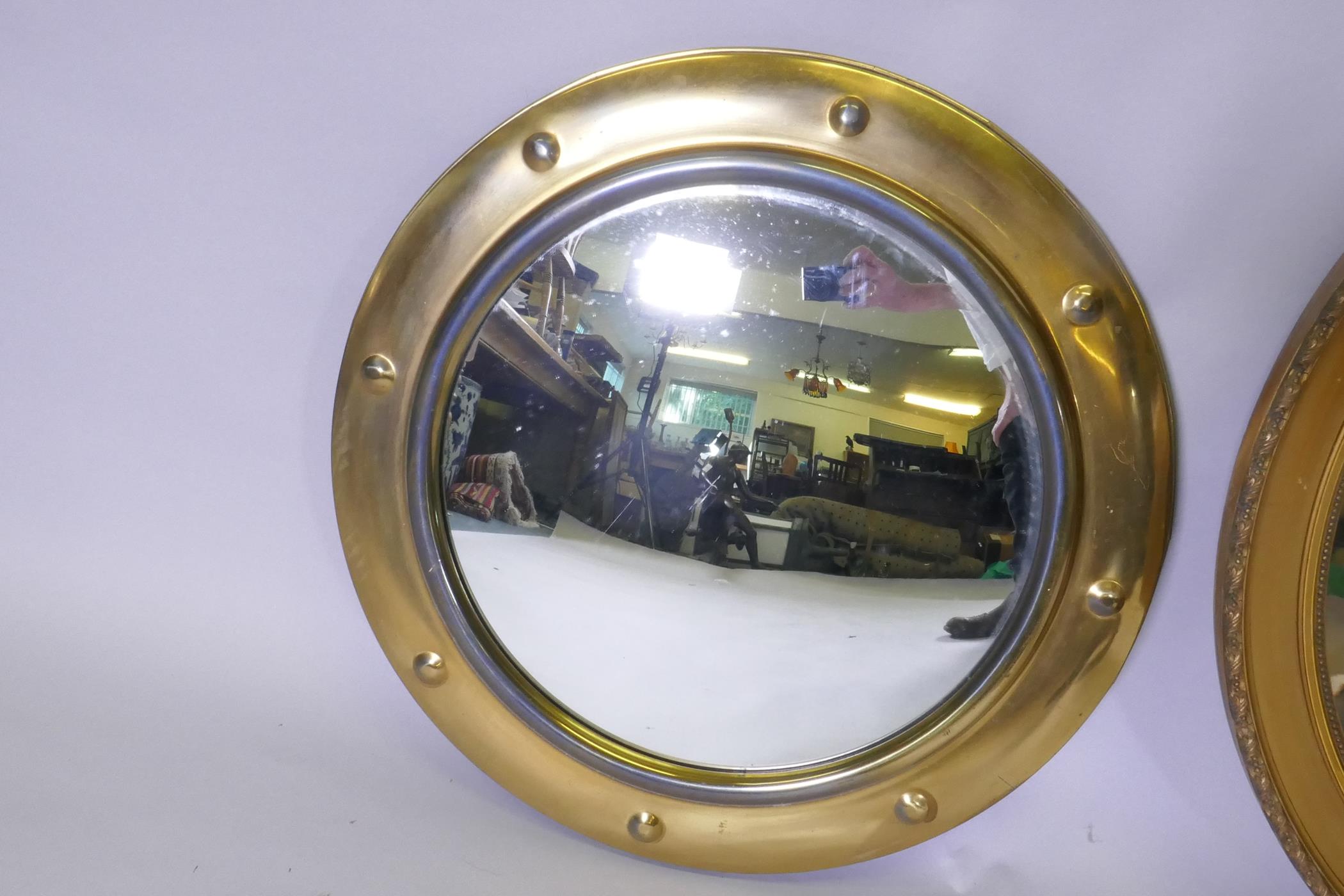 A vintage convex wall mirror with brass frame, 48cm diameter, another with pierced frame and a - Image 2 of 2