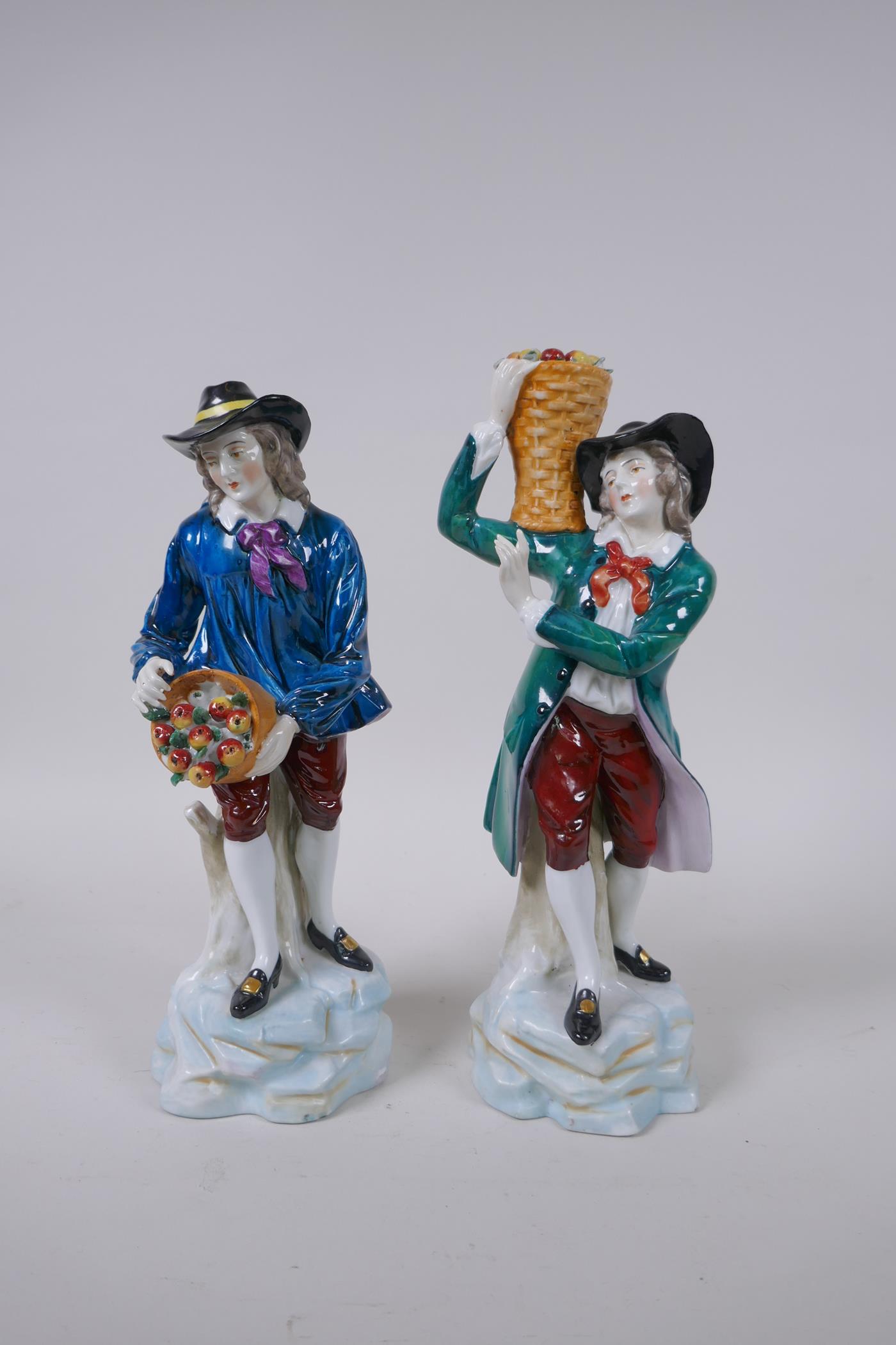 A pair of C19th Samson porcelain figures of apple pickers, gold anchor mark to base, 25cm high