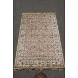 A gold ground full pile Kashmir rug with floral medallion design, 156 x 230cm