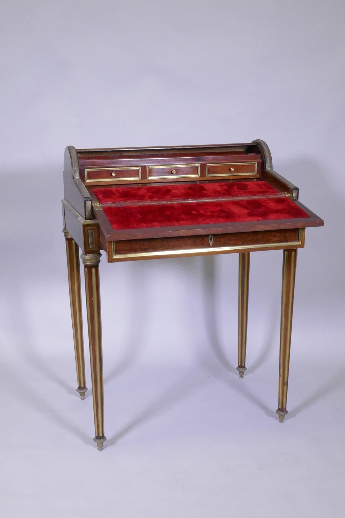 A French mahogany bonne heure du jour, with brass mounts, the pull out drawer operating the - Image 3 of 5