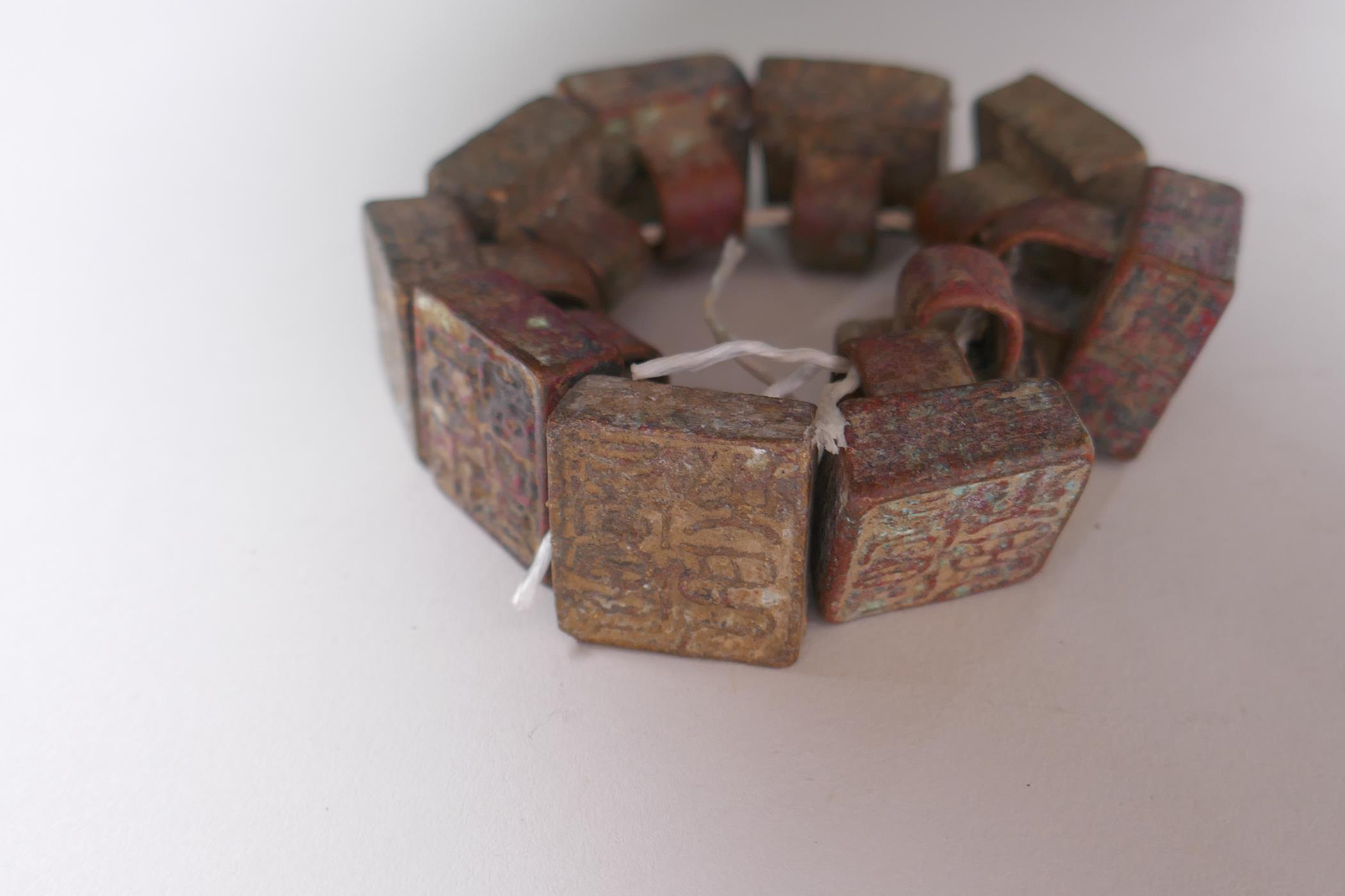 Ten archaic style Chinese bronze seals, 2 x 2cm - Image 5 of 5