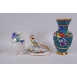 A continental porcelain figure group of pheasants, with gold anchor mark, together with a Franz