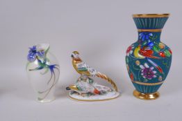 A continental porcelain figure group of pheasants, with gold anchor mark, together with a Franz