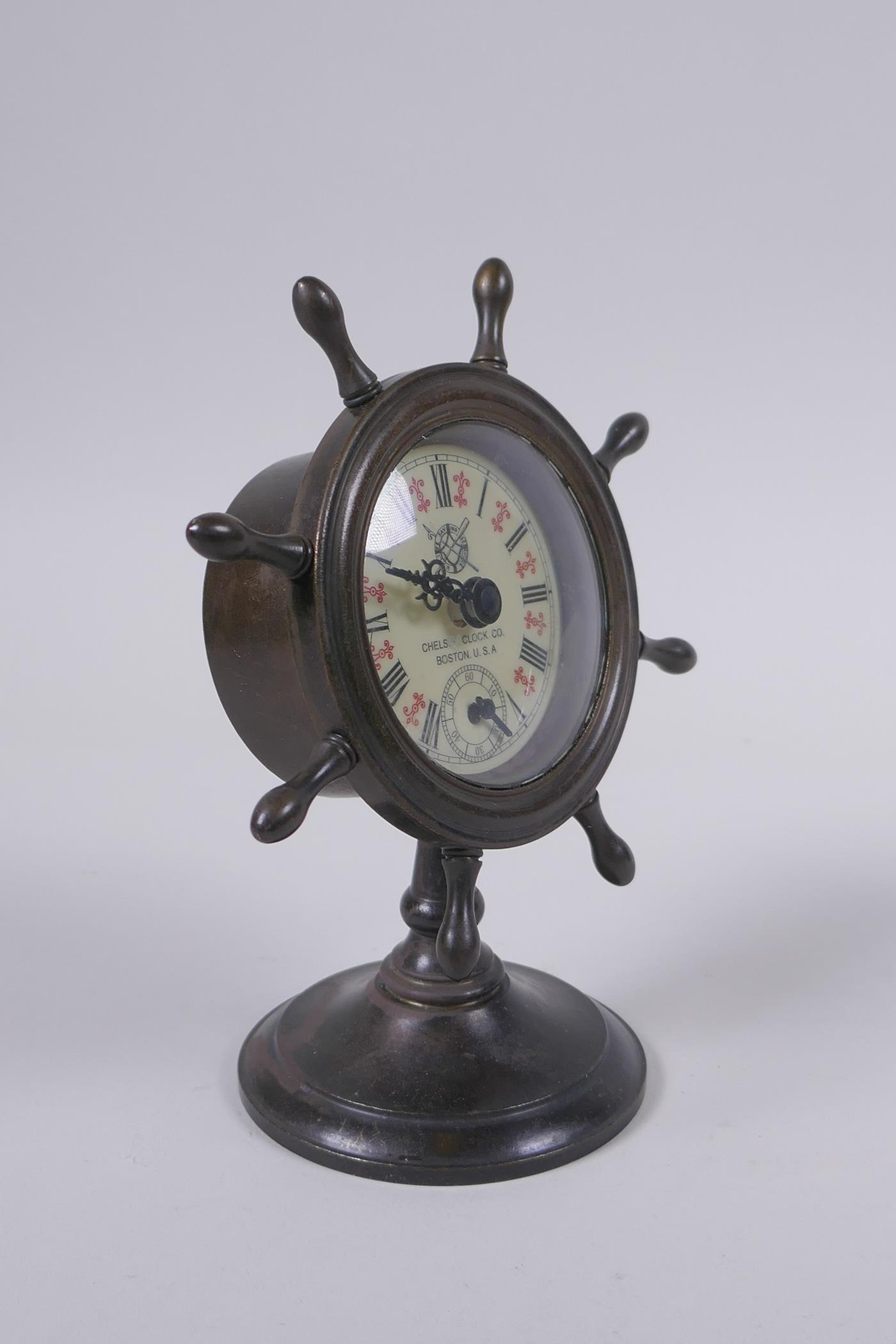 A bronze desk clock in the form of a ship's wheel, 15cm high - Image 2 of 3