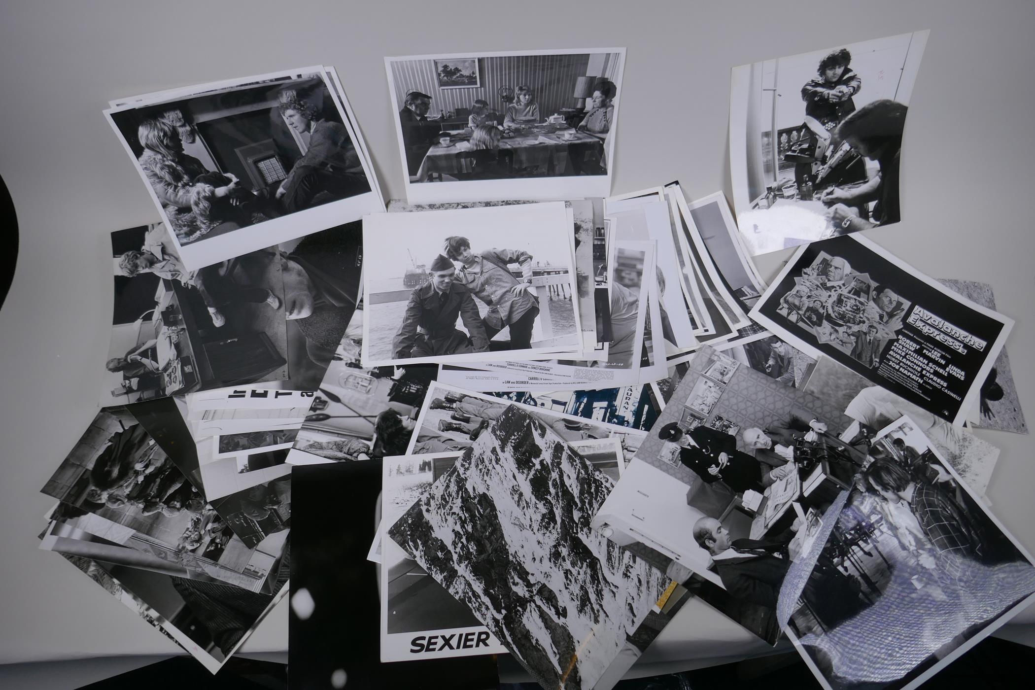 A quantity of black and white press and promotional photographs relating to films, including A - Image 6 of 6