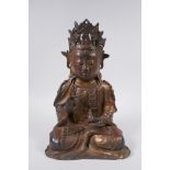 A Sino Tibetan gilt bronze figure of Buddha, 31cm high