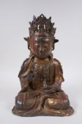 A Sino Tibetan gilt bronze figure of Buddha, 31cm high