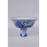A Chinese blue and white porcelain stem bowl decorated with dragons, Xuande 6 character mark to