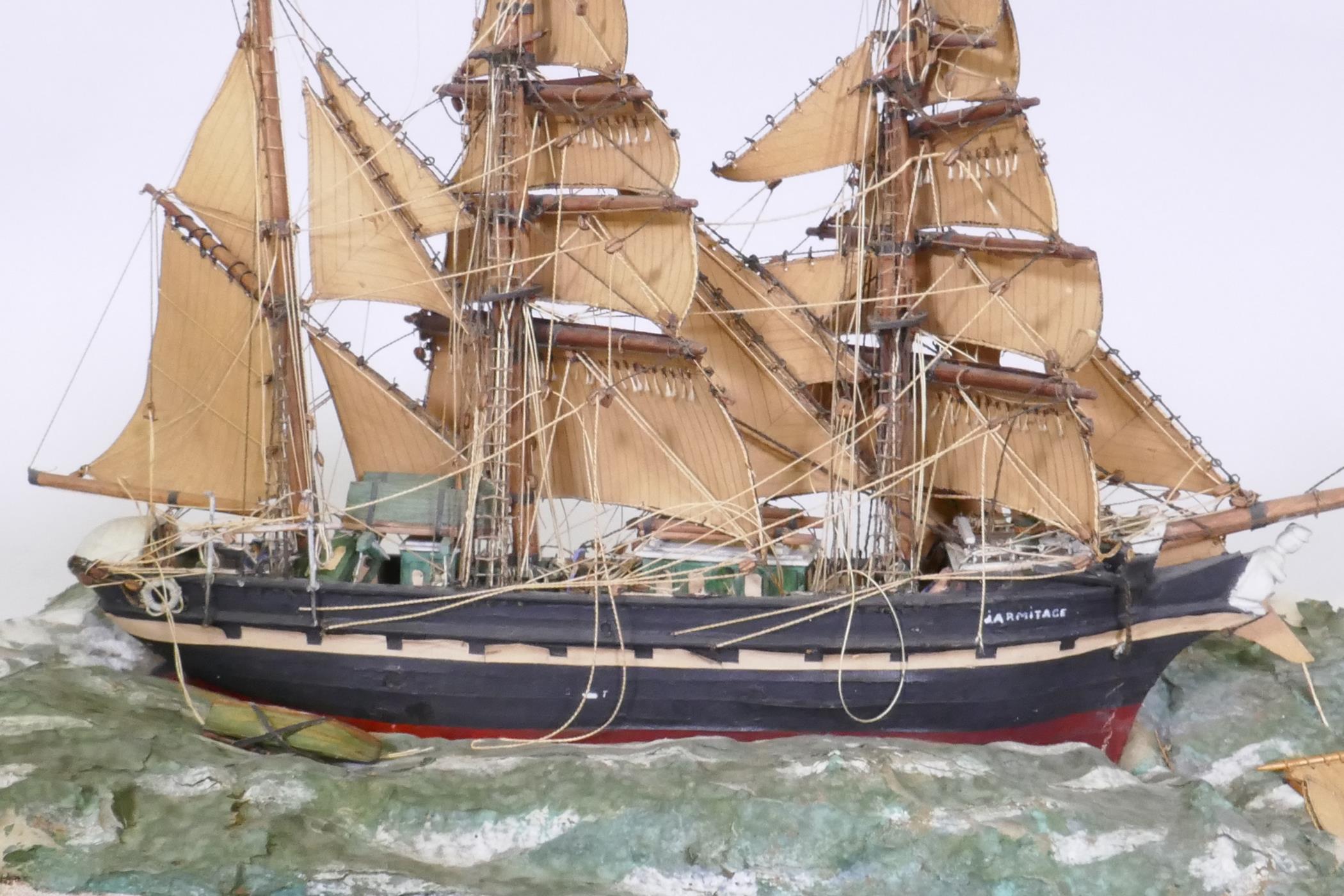 A model of a three masted sailing ship, Armitage in stormy seas, set in a diorama and glass case, AF - Image 2 of 4