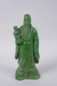 A Chinese green hardstone figure of Shou Lao, 20cm high