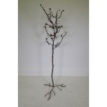 A wrought iron tree with amber glass blossoms, 156cm high