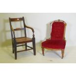 A Victorian carved walnut nursing chair, AF, and a C19th beechwood and elm open arm chair