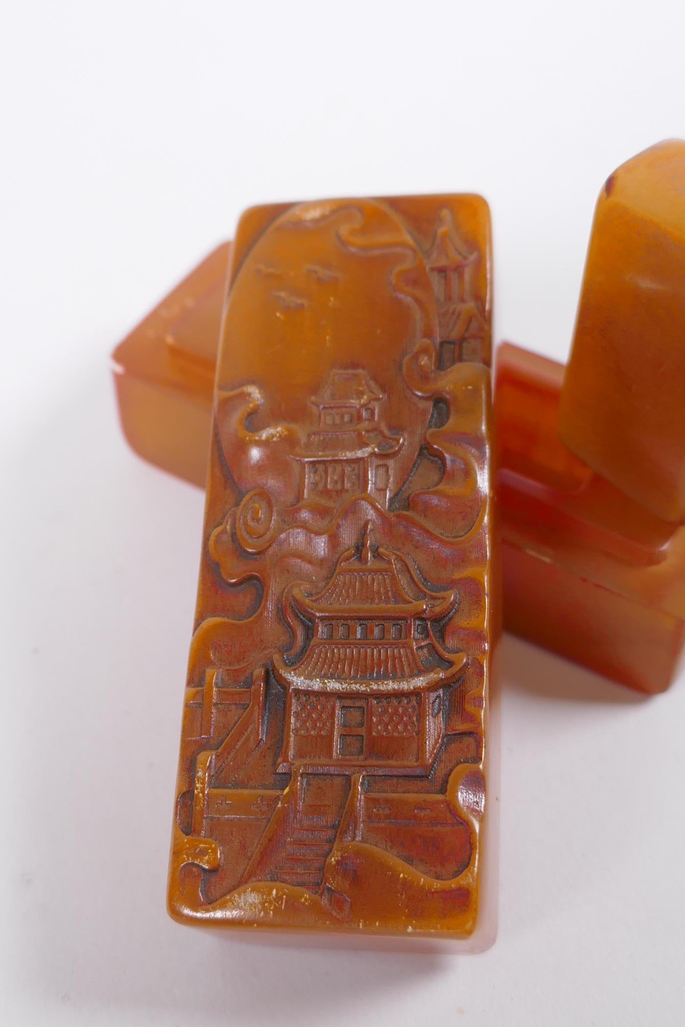 A Chinese amber soapstone box containing an amber soapstone seal, the cover with carved decoration - Image 2 of 4