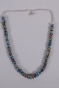 A Venetian glass eye bead necklace, 64cm long