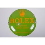 A vintage style 'Rolex' enamel advertising sign, 30cm diameter