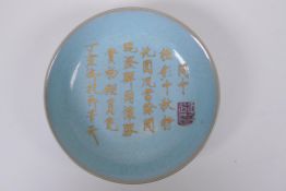 A Chinese celadon crackle glazed dish with chased and gilt character inscription to bowl, 2