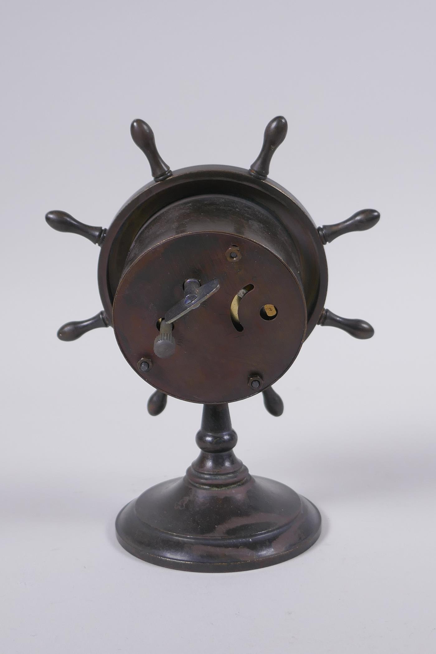 A bronze desk clock in the form of a ship's wheel, 15cm high - Image 3 of 3