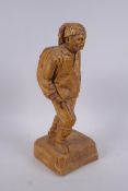 Adalbert Thibault, (Canadian), mid C20th wood carving of a hunter, 35cm high
