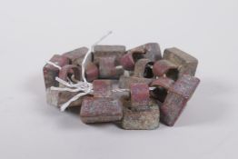 Ten archaic style Chinese bronze seals, 2 x 2cm