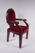 A mahogany balloon back dolls arm chair, 47cm high