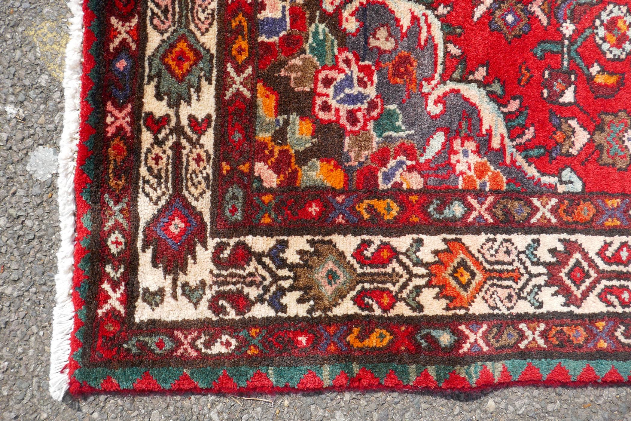 A rich red ground full heavy pile Iranian runner, AF, 104 x 365cm - Image 3 of 6