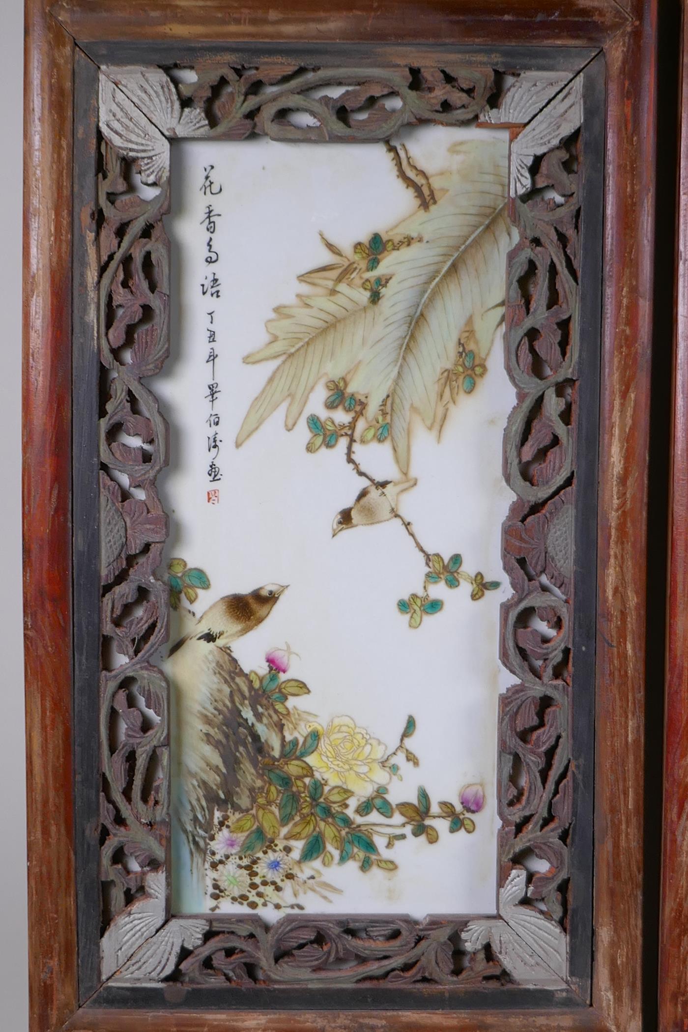 A pair of early C20th Chinese polychrome porcelain panels decorated with birds amongst flowers, - Image 2 of 5