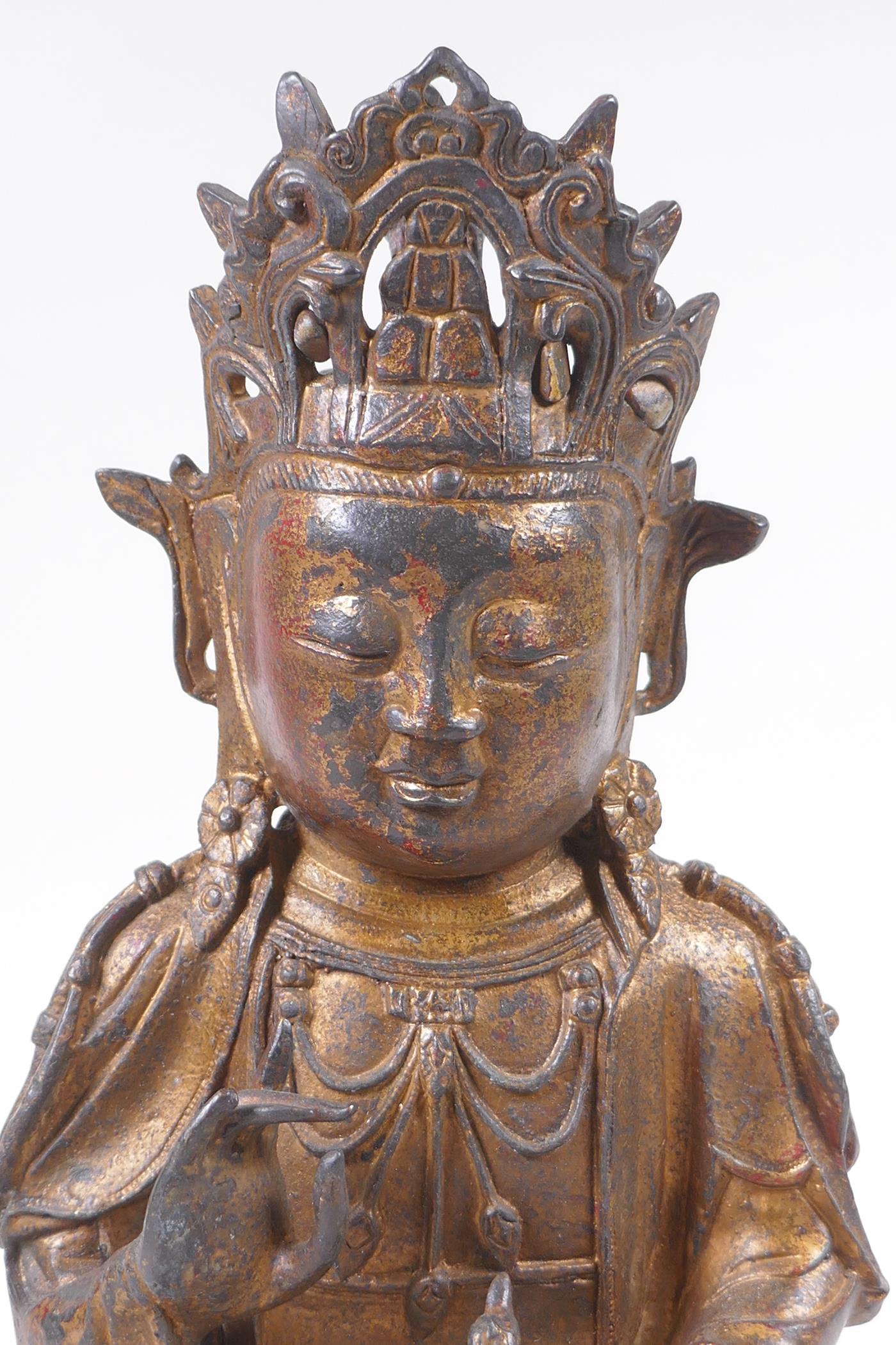 A Sino Tibetan gilt bronze figure of Buddha, 31cm high - Image 2 of 6