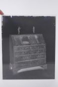 A collection of eight early to mid century glass plate negative photographs of antiques, possibly by