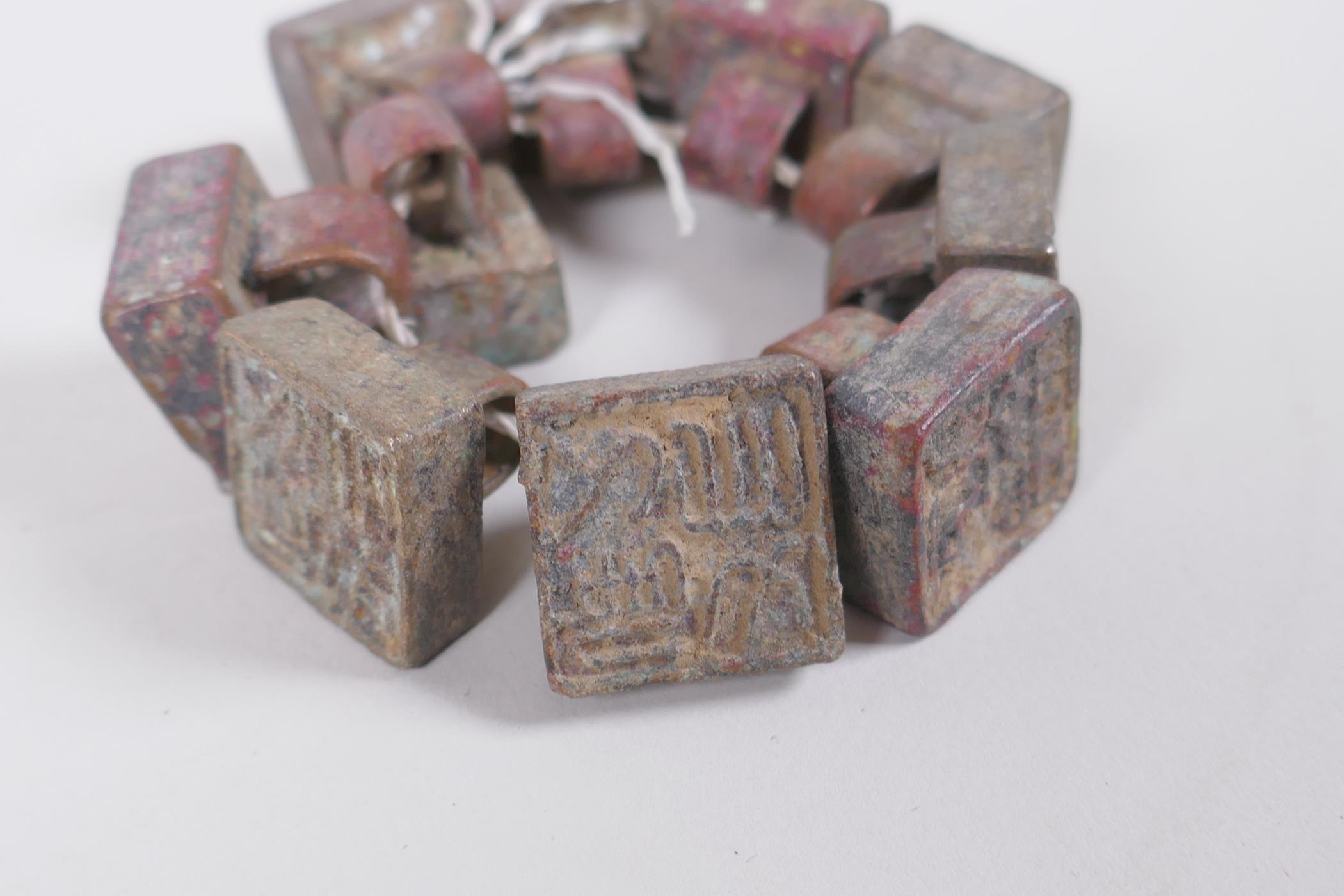 Ten archaic style Chinese bronze seals, 2 x 2cm - Image 3 of 5