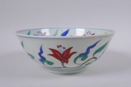 A Doucai porcelain bowl with scrolling floral decoration, Chinese Chenghua 6 character mark to base,