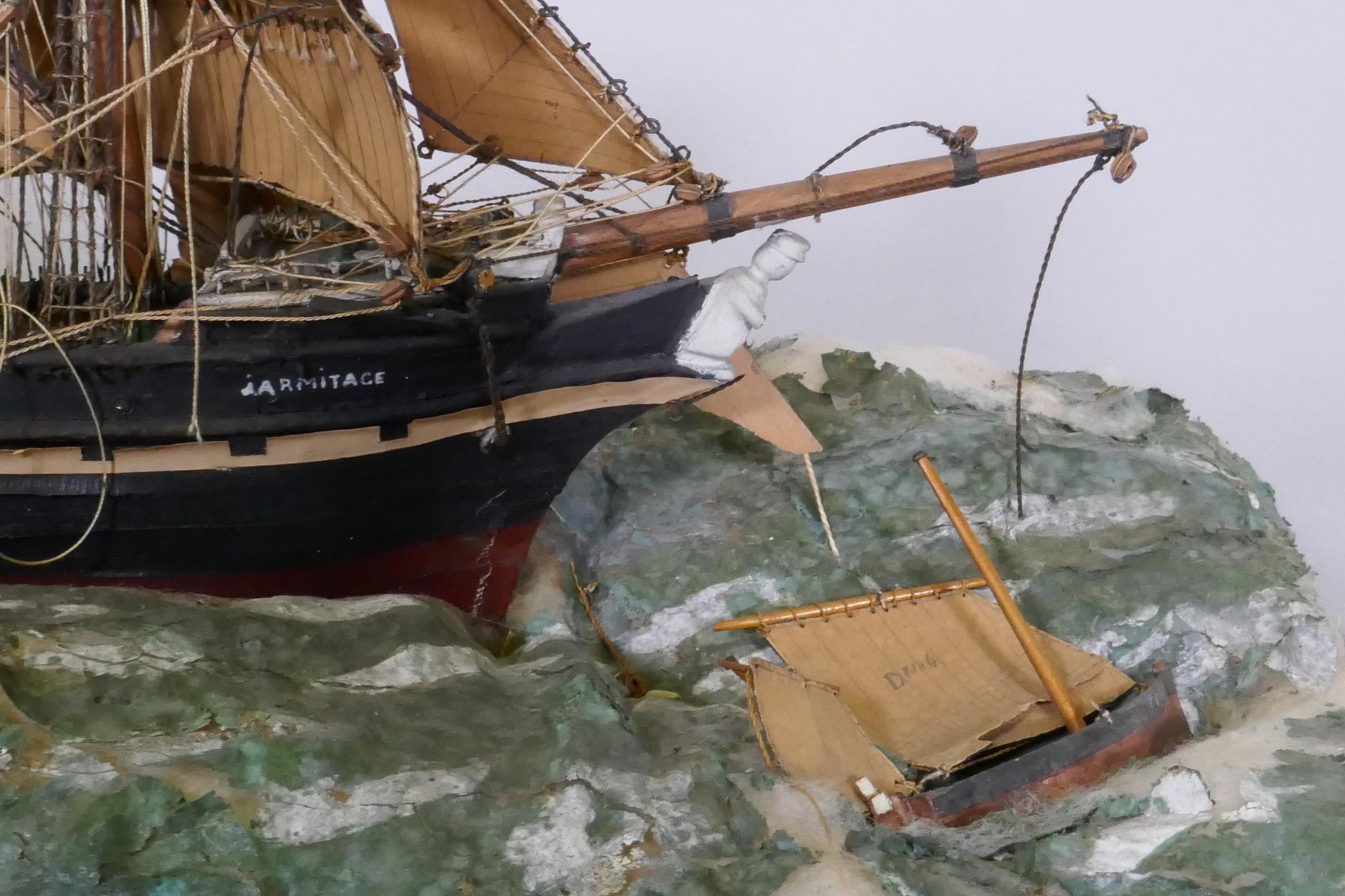 A model of a three masted sailing ship, Armitage in stormy seas, set in a diorama and glass case, AF - Image 3 of 4