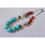 An oriental turquoise and enamelled bead necklace, 48cm long