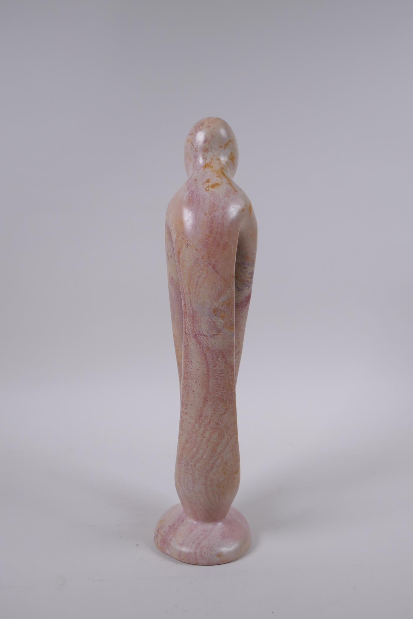 A Kenyan carved and polished Kisii stone figure group in the form of a mother and child, 23cm high - Image 4 of 5