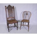 An early C19th elm wheel back dining chair with crinoline stretcher, AF, and an C18/C19th French oak