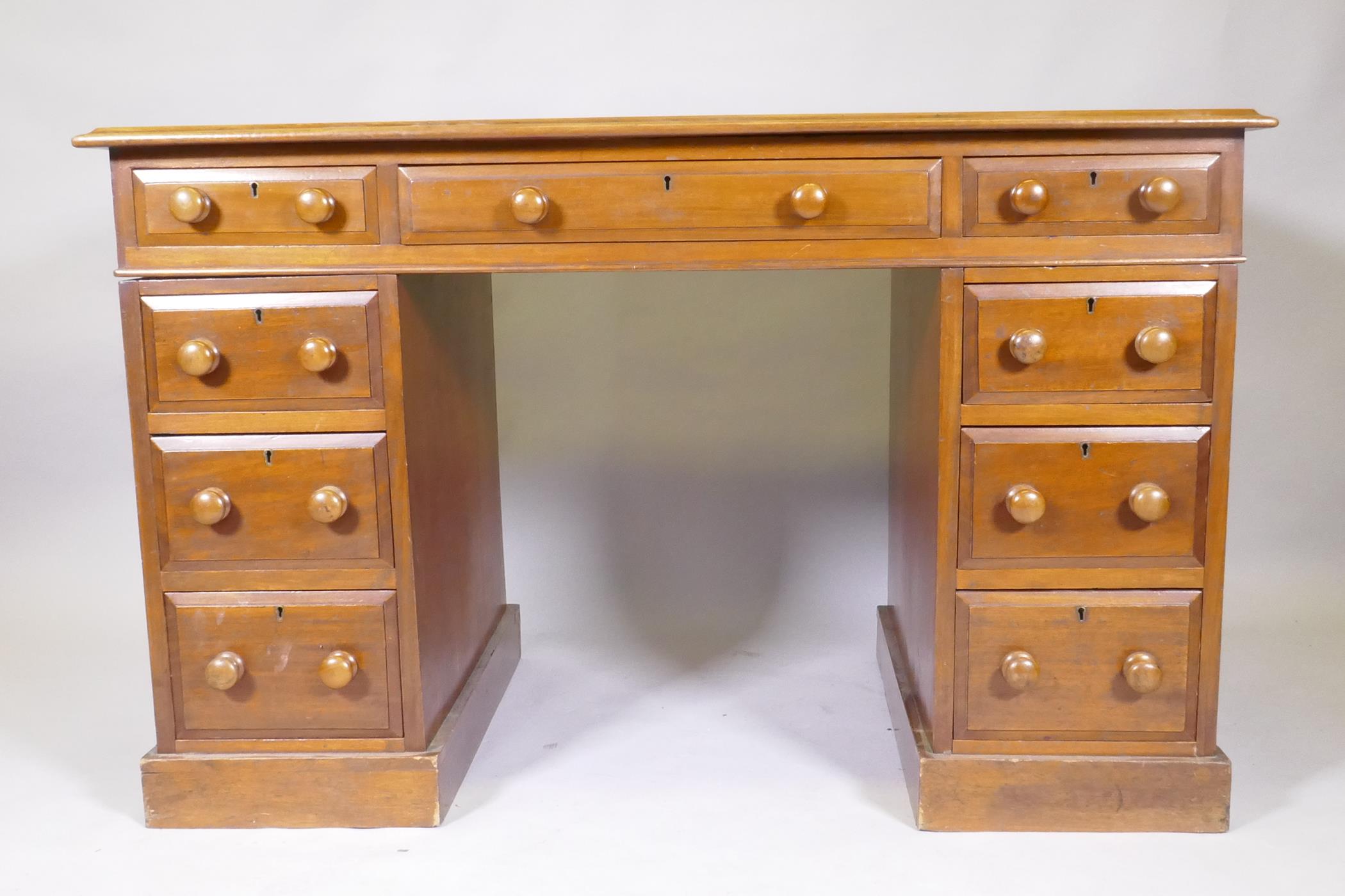 A Victorian mahogany nine drawer pedestal desk, with moulded feet details, wood knobs and inset - Image 2 of 3