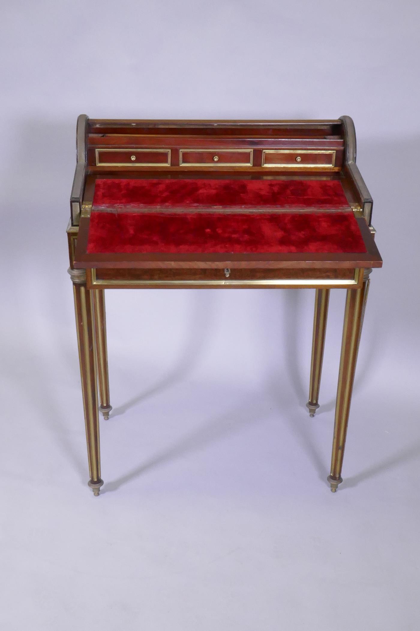 A French mahogany bonne heure du jour, with brass mounts, the pull out drawer operating the - Image 4 of 5