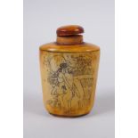 A Chinese bone snuff bottle decorated with erotic scenes, 6cm high